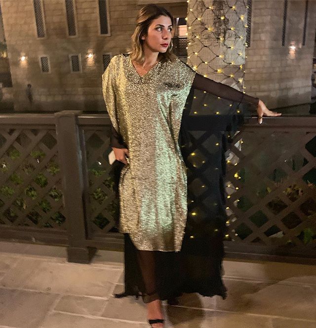 ✨ In love with this weightless gold shimmering liquid silk-lame meets sheer black mix dress #ss19 #marinaqureshi #followthesparkle #ramadanoutfit